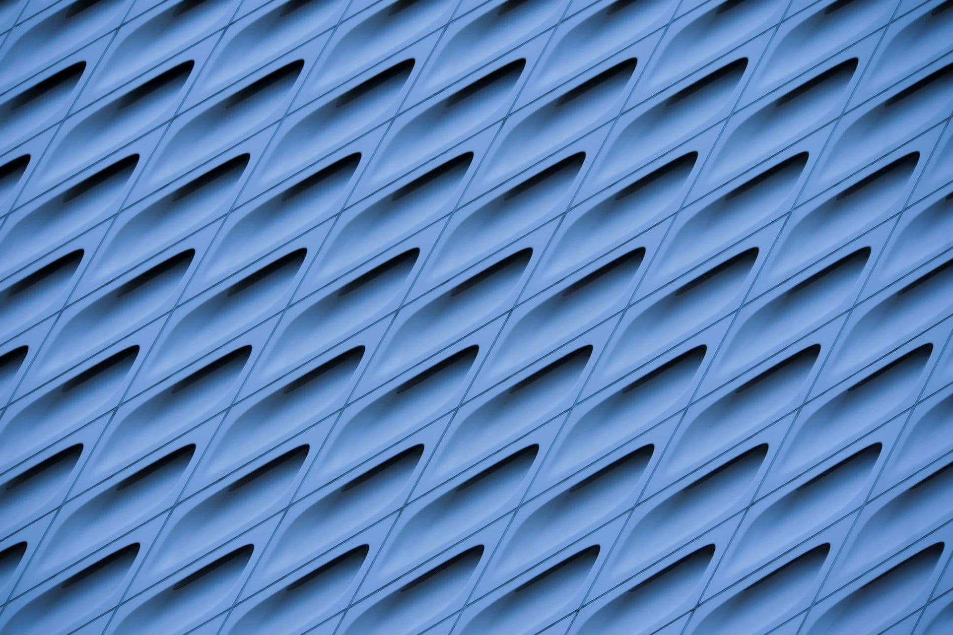 An image showing blue background with dark holes in between nodes