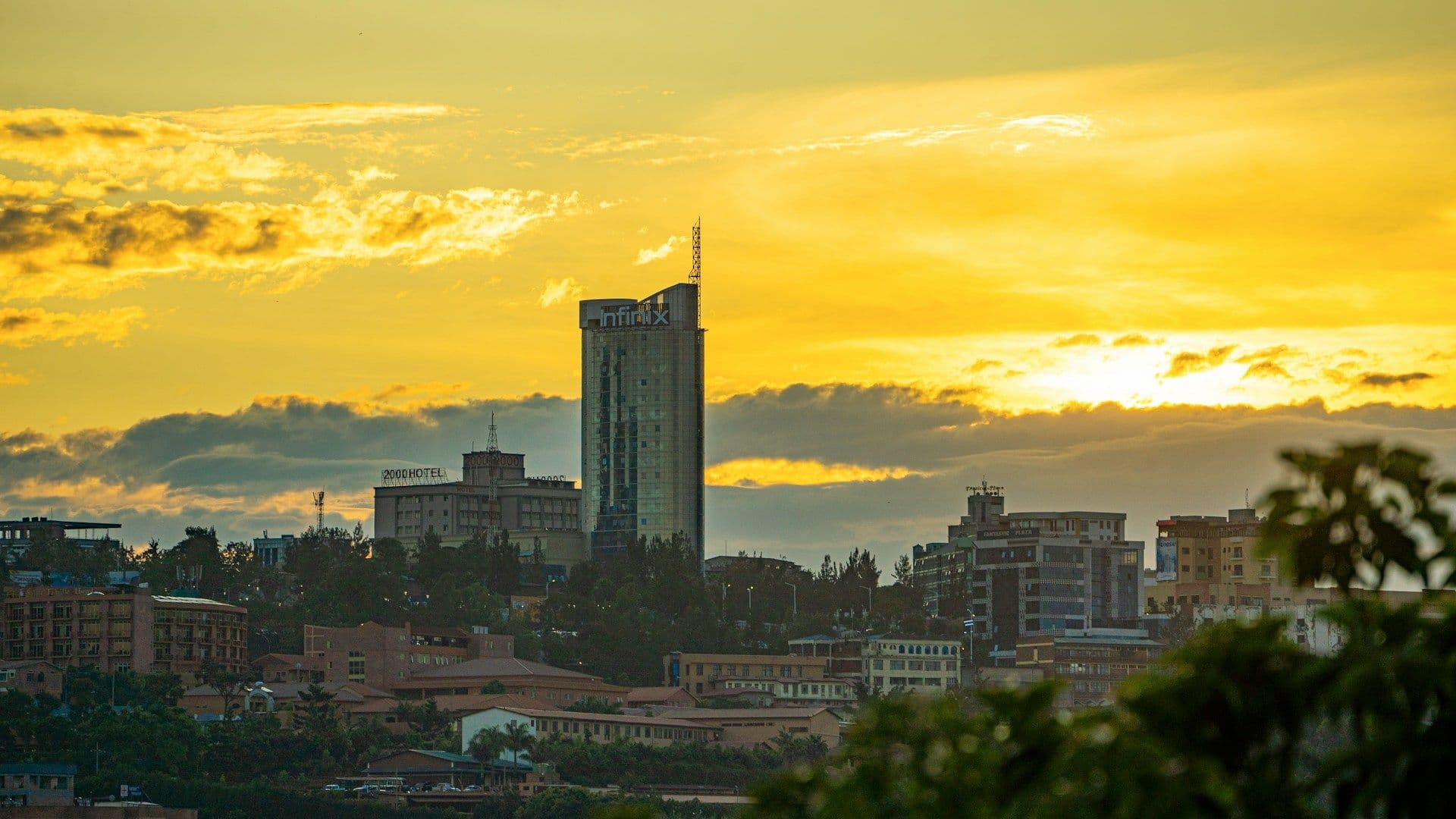 An image illustrating the beautiful scenario of Kigali City Plaza (Located in the center of Kigali) during sunset.